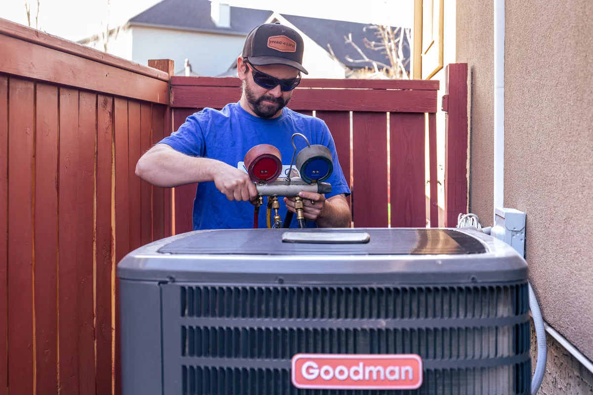 Vero Mechanical technician repairing an air conditioner